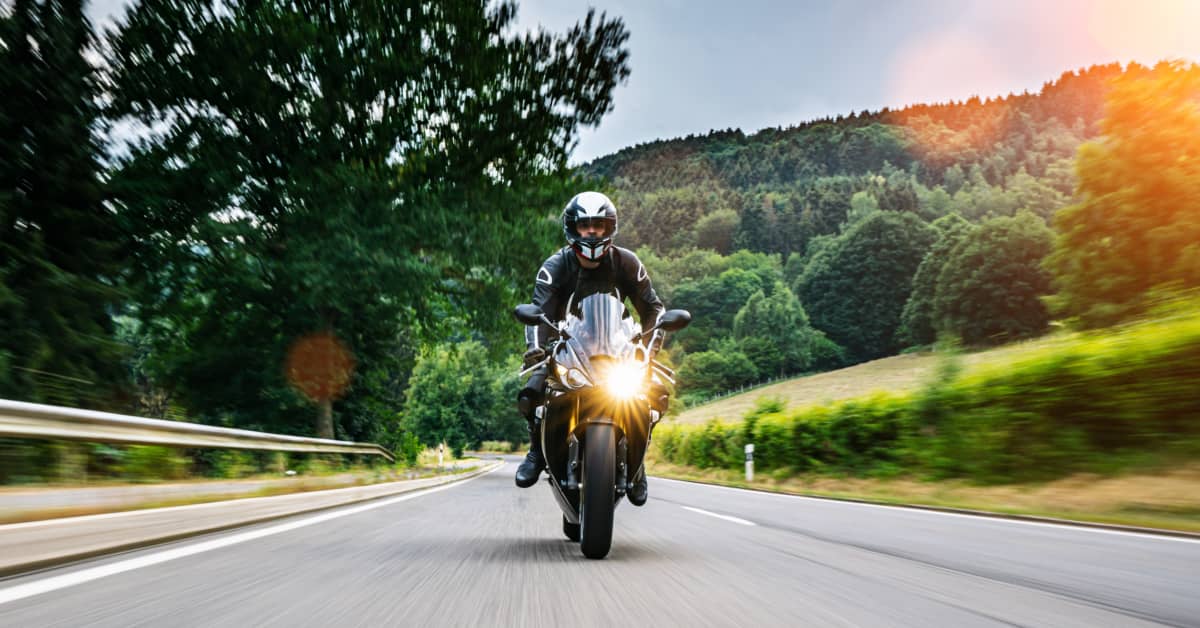 Helmet Cam Captures Motorcycle Reacting To Impending Car Crash