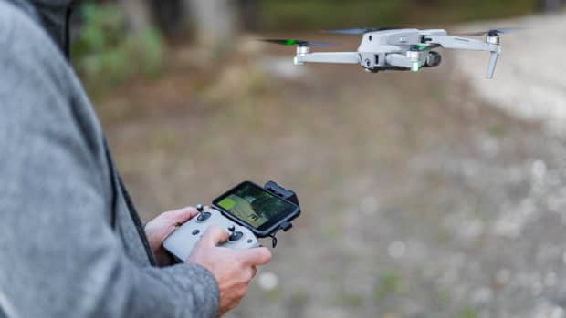 Pilot flying drone through radio-controlled handset
