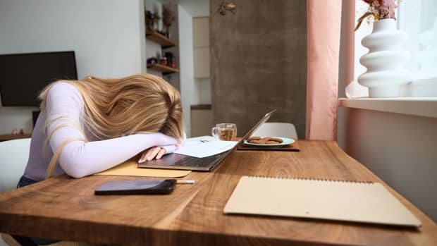 woman dozing off while working