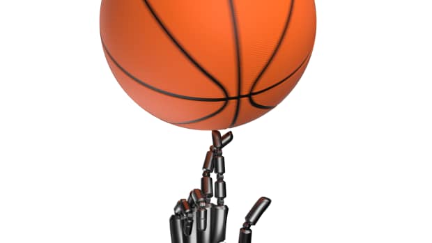 Robot with basketball.