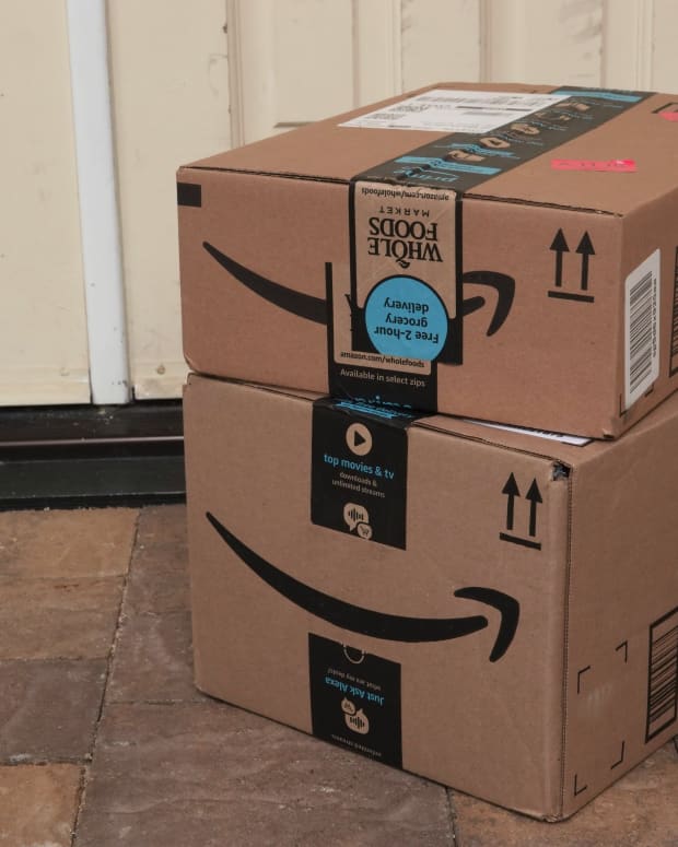 Amazon packages in front of a door