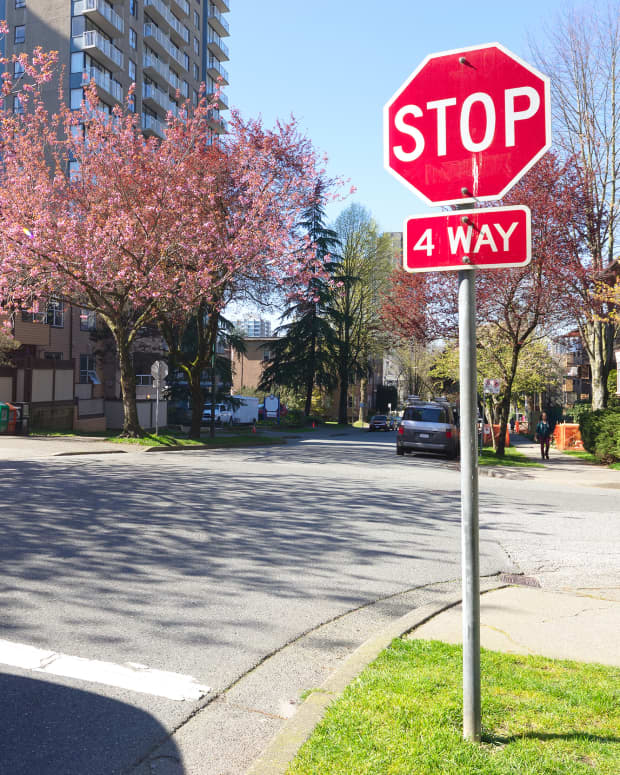 Four-way intersection stop sign.