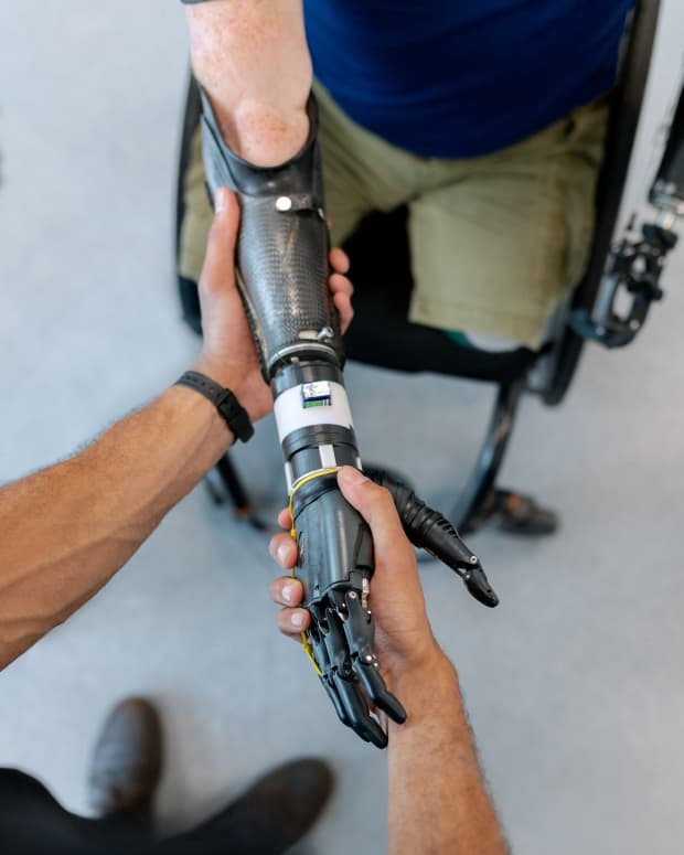 A bionic arm and hand being tested.