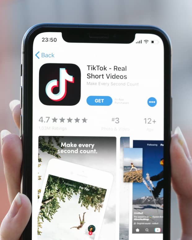 Iphone downloading TikTok app.