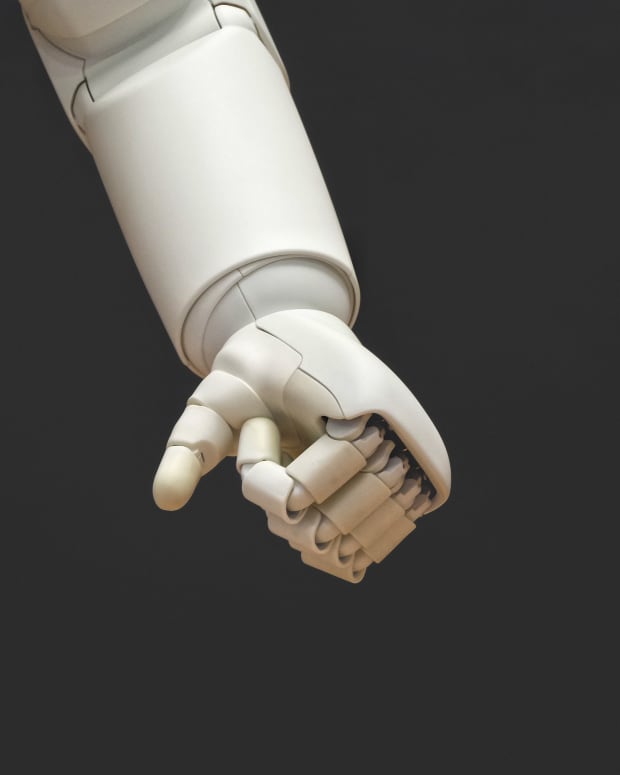 The closed fist of a robot