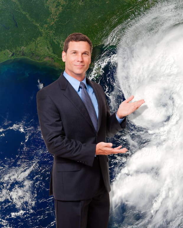 A meteorologist forecasting the weather