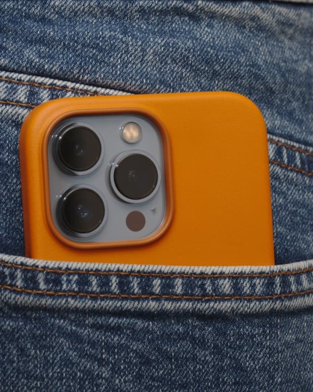 Leather iPhone case covering an iPhone inside a pocket