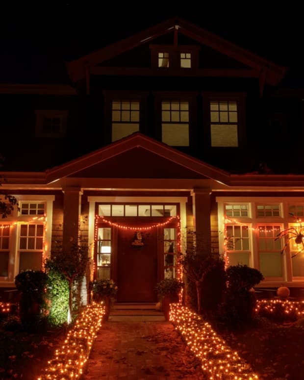 A house decorated with lights for Halloween