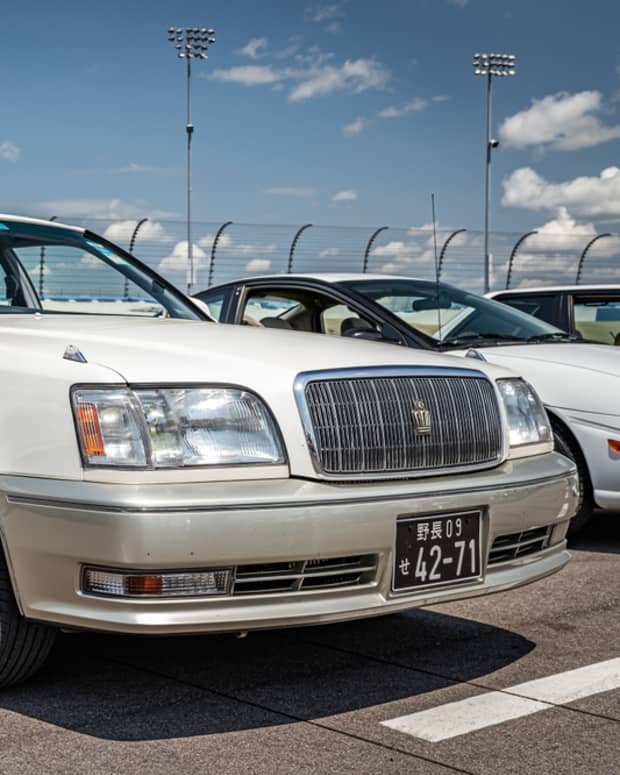 Toyota Crown Majesta in a parking lot.